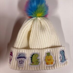 Moriah Elizabeth Beanie with Rainbow Pom Pom and Character Patches